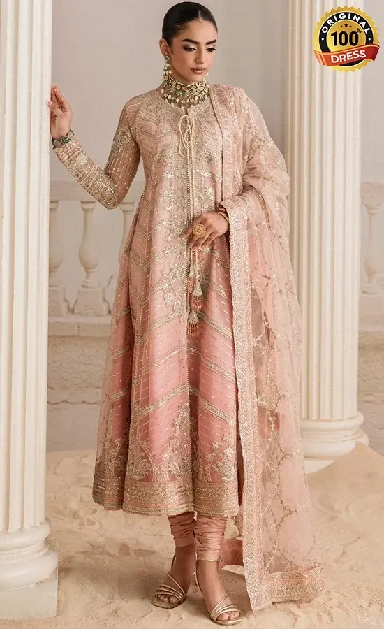 Peach colour shalwar kameez for wedding guests with elegant embroidery and floral detailing