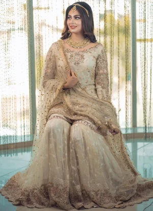 Off white multicolor embroidered gharara suit in organza with floral work, scalloped gharara border and matching dupatta