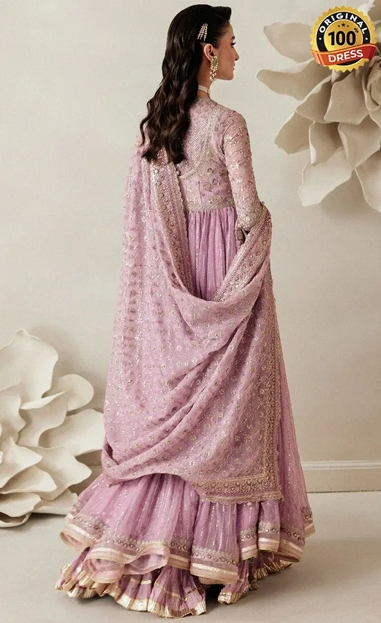 Embroidered purple Anarkali dress for wedding guests with sequinned work and pearl detailing