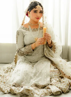 Light grey bridal gharara with chiffon shirt, brocade gharara, organza dupatta and silver, gold and copper-toned embroidery