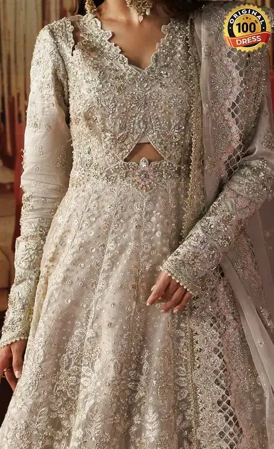 Pakistani white maxi dress for wedding guests with embroidered organza and timeless formal styling