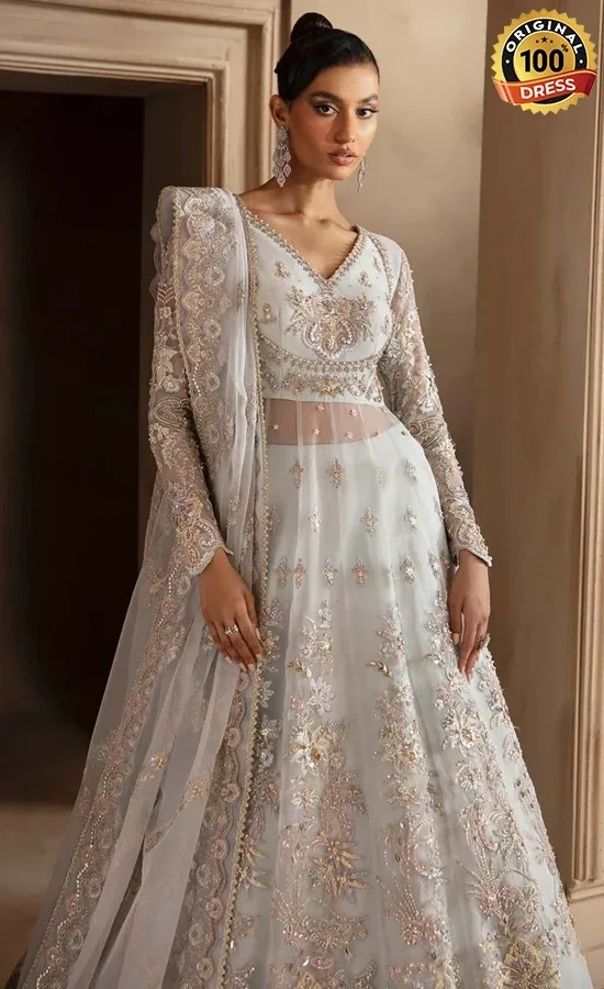 Sea blue organza lehenga choli with hand embellishment, patchwork and tassel detailing