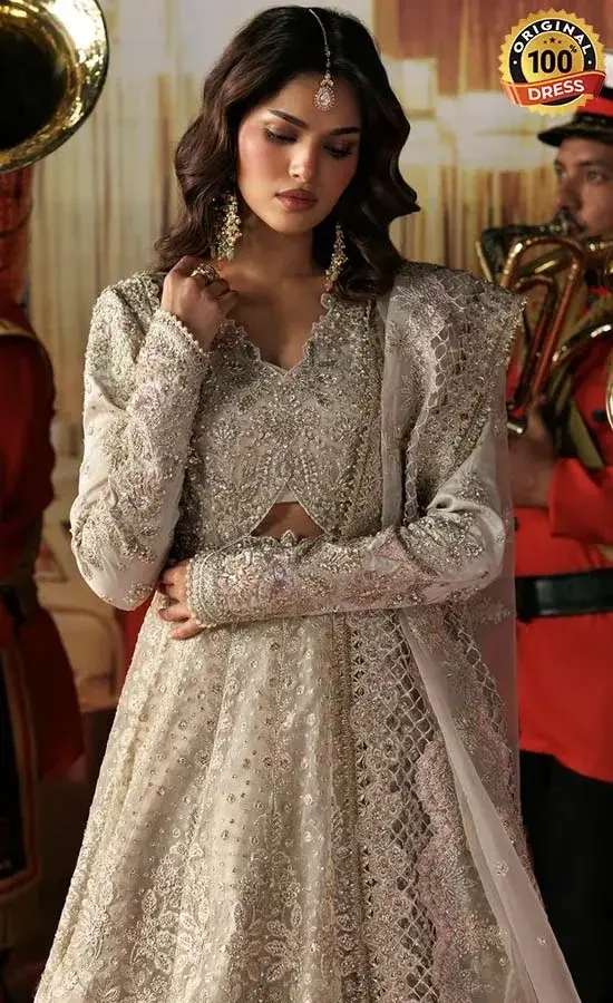 White organza maxi dress with intricate embroidery and elegant wedding wear detailing