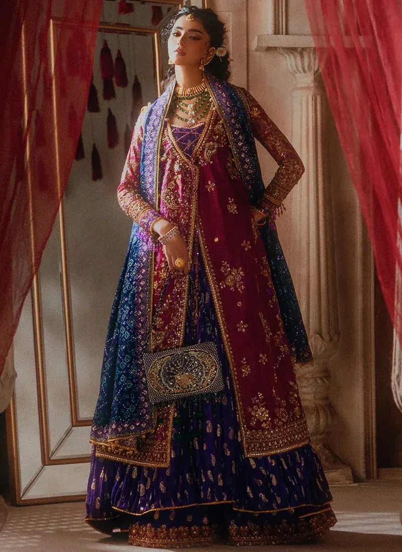 Royal blue salwar kameez featuring hand embroidery, Kiran lace and patchwork detailing