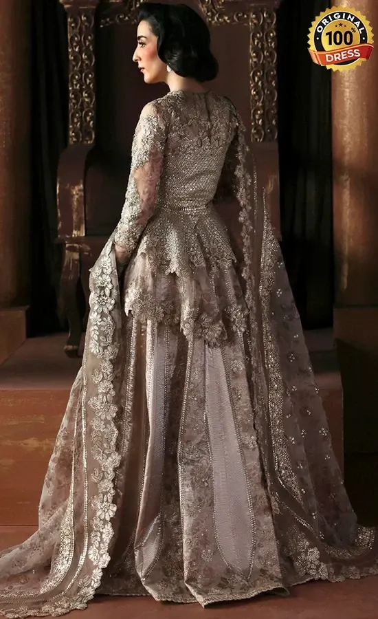 Champagne lehenga choli with hand embroidery, samosa lace and shuttle lace finishing
