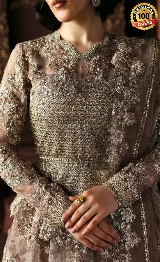 Champagne lehenga for wedding guests with elegant hand embroidery and traditional detailing