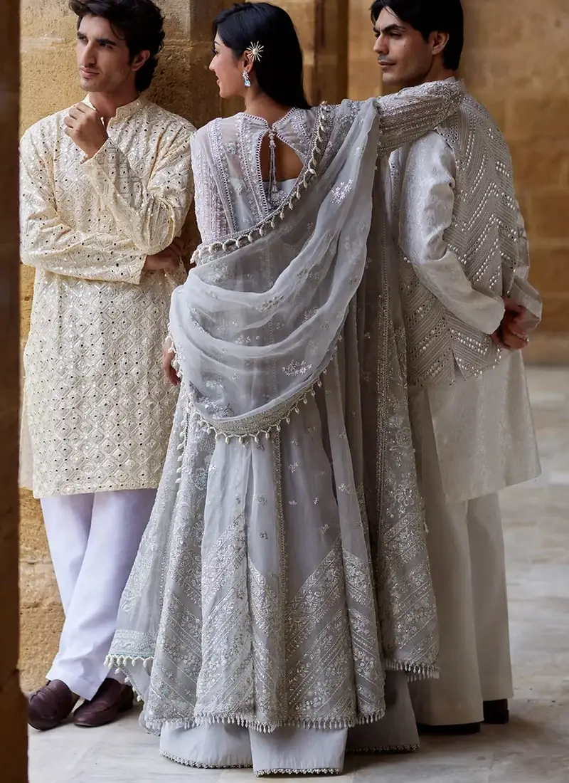 Ice blue shalwar kameez with embroidered front panels and decorative patchwork