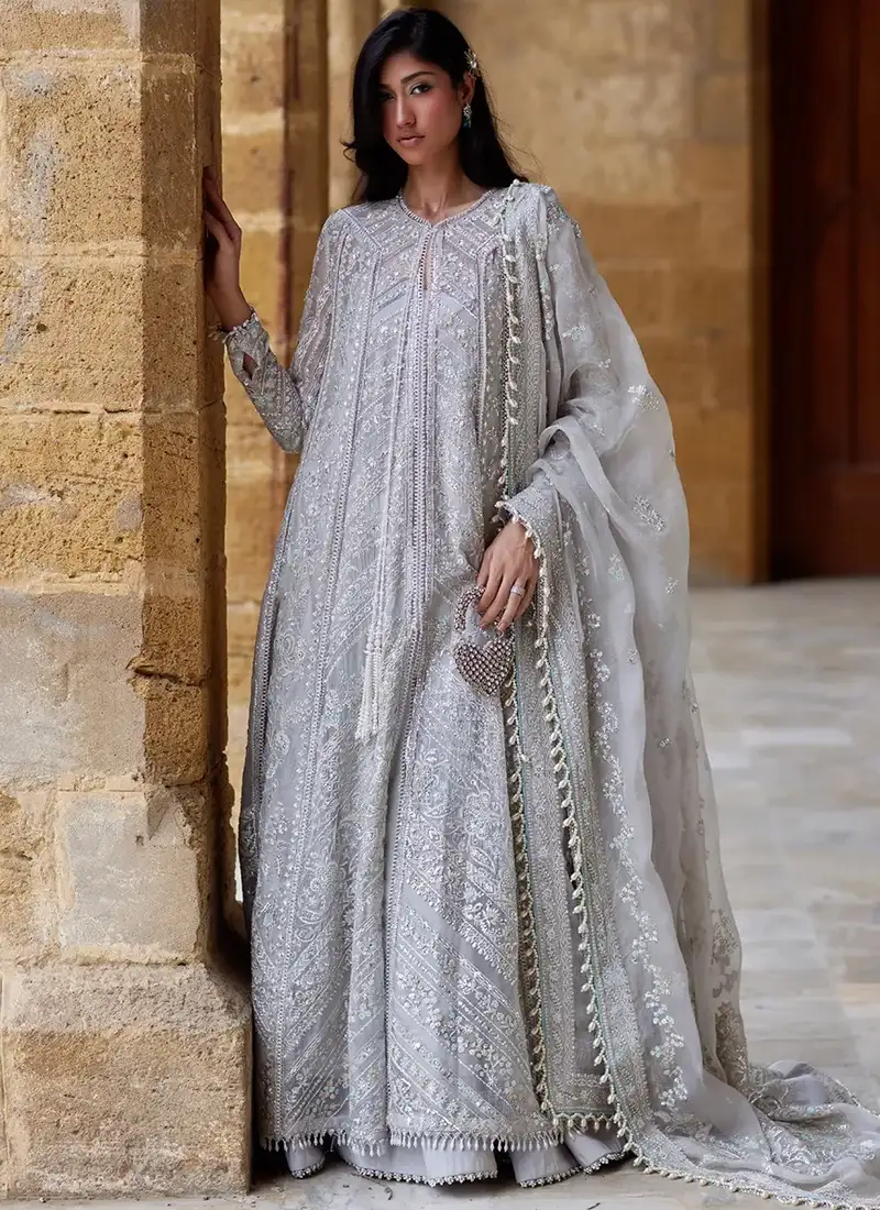 Light Blue Salwar Kameez For Wedding Guests Light blue wedding guest suit with floral embroidery, patchwork and decorative tassels