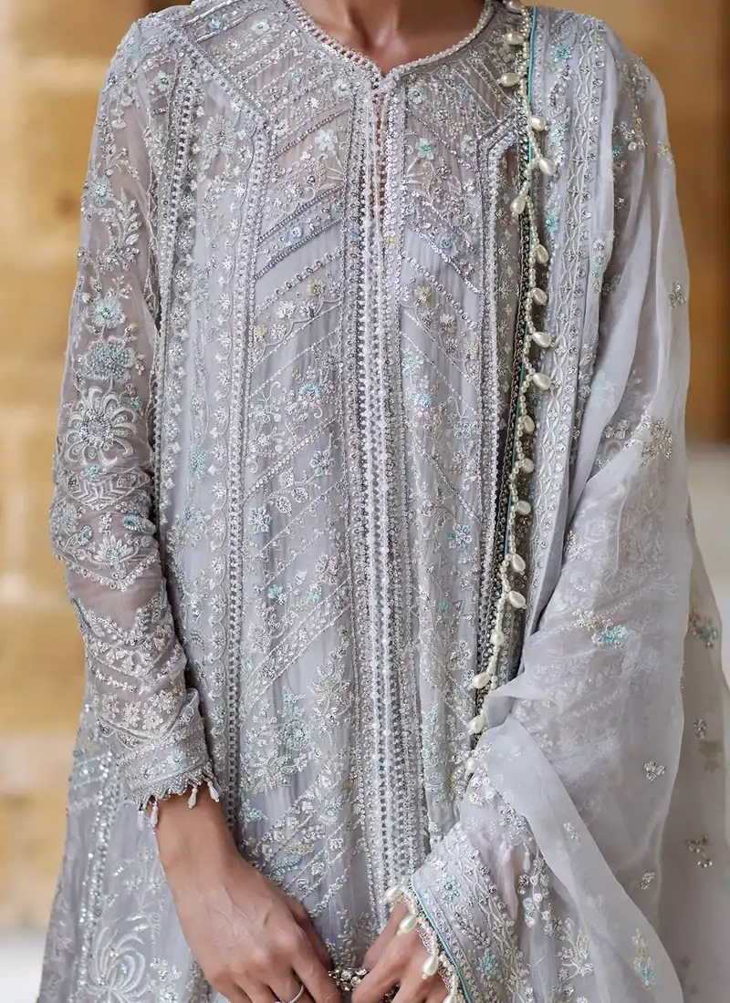 Light blue salwar kameez for wedding guests with floral threadwork and sequin detailing