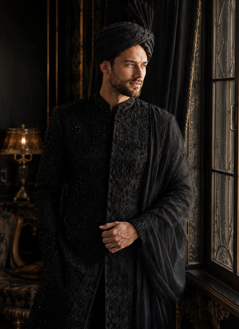 black-sherwani-with-black-shawl-turban-groom-look Groom wearing a black sherwani with a matching turban and shawl