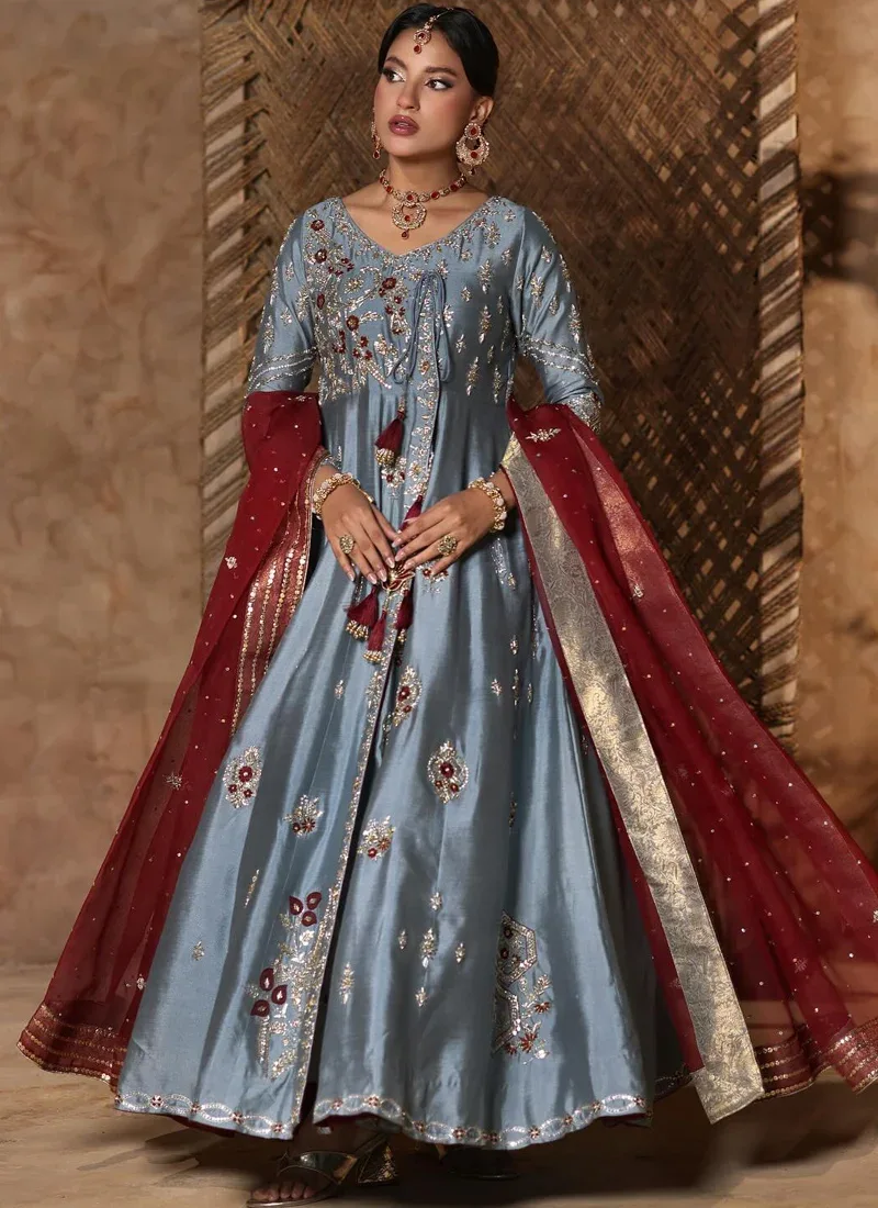 Bluish Grey Pakistani Bridal Angrakha Peshwas Bluish grey bridal Pishwas in tissue silk with gold-toned embroidery, tissue silk trousers and maroon chiffon dupatta