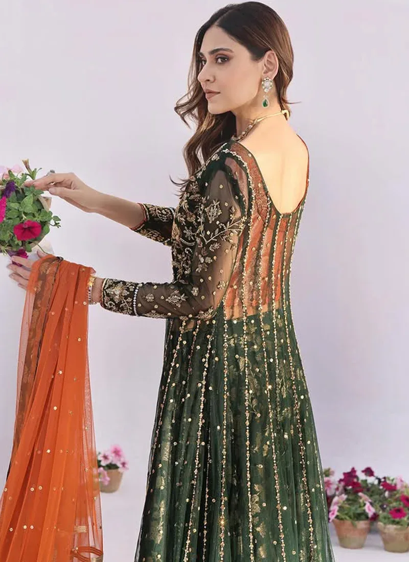 Bottle green open gown styled with a burnt orange dupatta and traditional Dhaka pajama