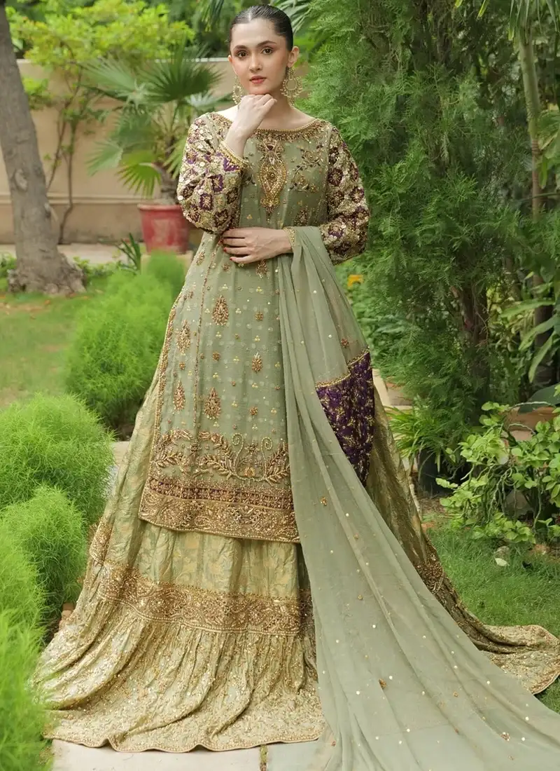 Sage green Farshi lehenga with gold, silver and tonal embroidery, purple full sleeves and a broad worked daman