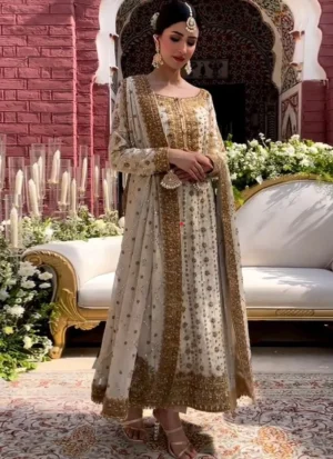 Ivory bridesmaid salwar kameez with ankle-length tissue silk shirt, tissue silk trousers and chiffon dupatta