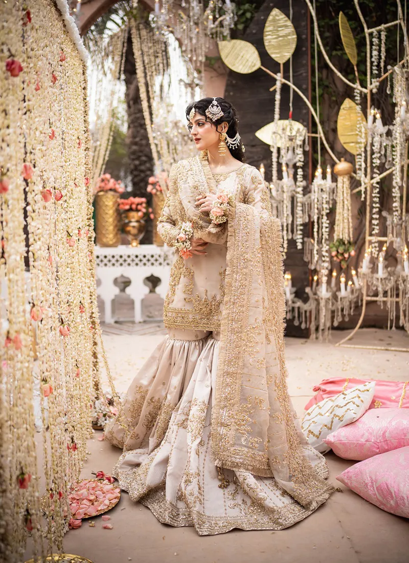 Ivory organza Farshi gharara bridal set with gold and rose-gold embroidery, organza shirt and matching dupatta