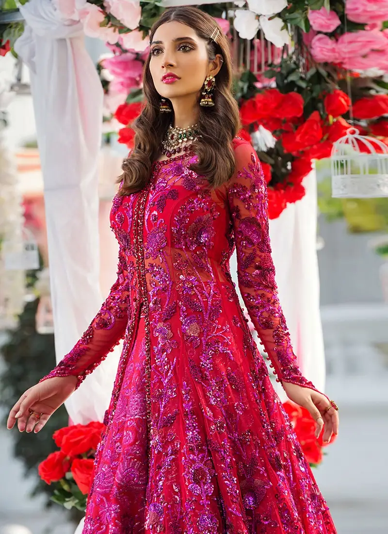 Cherry-red bridal gown and lehenga with tonal floral embroidery and purple-magenta accents