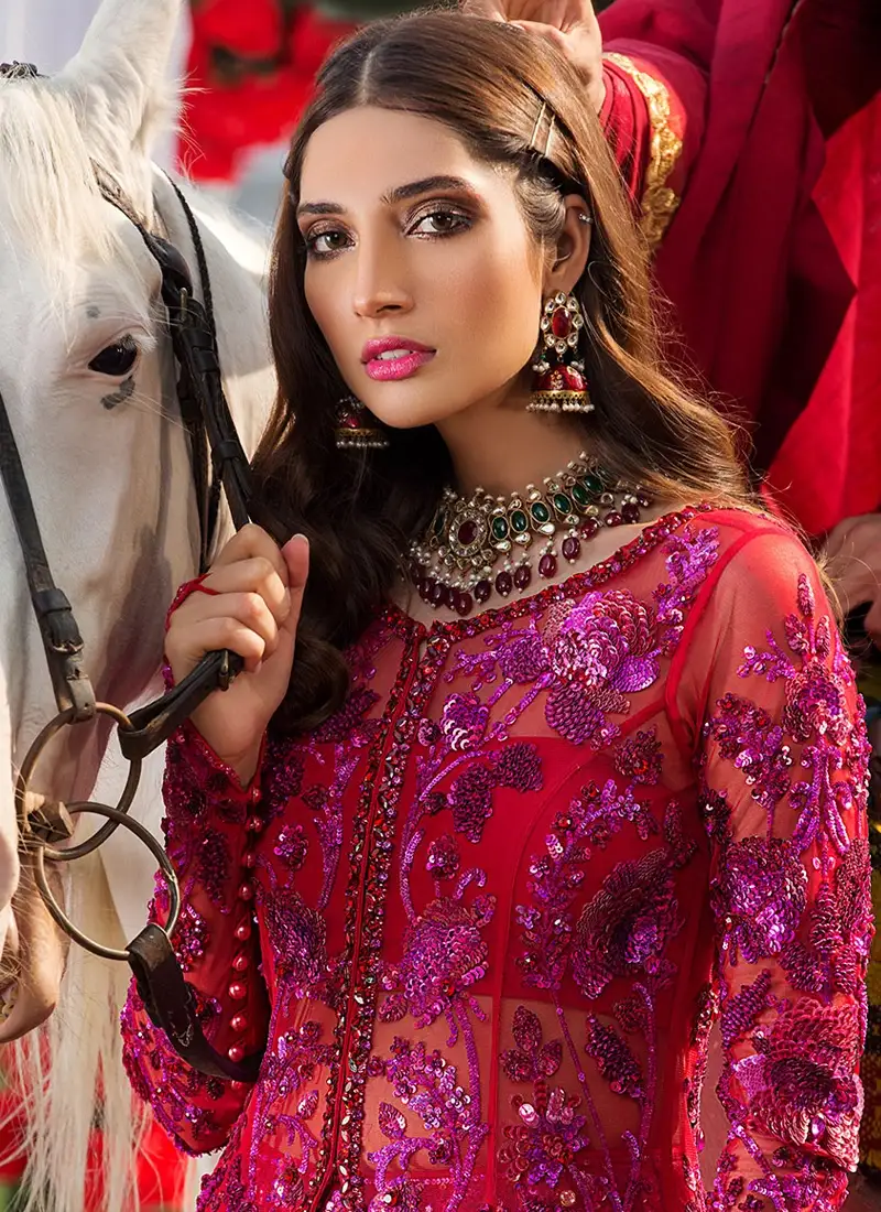 Nomi Ansari red open gown with panelled flare, cutdana and nakshi work over a brocade lehenga