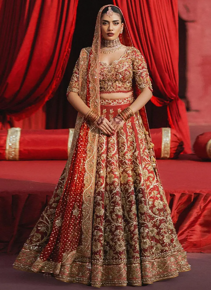 Nomi-Ansari-Walima-Lehenga-1 Nomi Ansari red Walima lehenga choli in tissue silk with matching chiffon dupatta and heavy gold embroidery