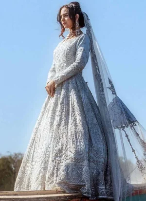 Ice blue floor-length bridal maxi in organza and American Katan silk with silver embroidery and matching organza dupatta.
