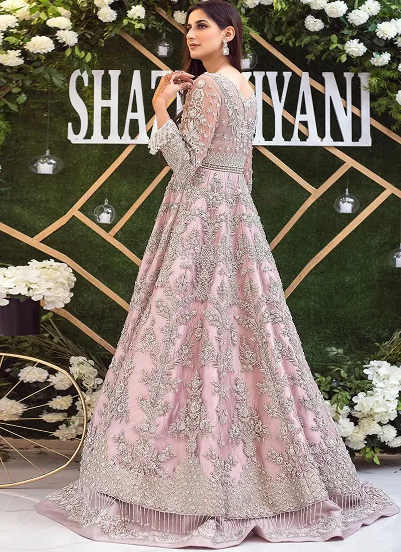 Baby pink Walima peshwas and lehenga with dense silver aari, dabka, kora and zari work across the bodice and hem