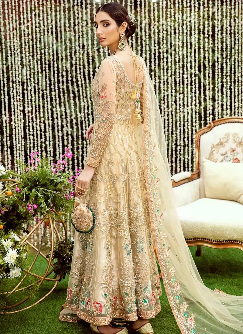 Champagne gold bridal pishwas rear view with deep rounded back and long embroidered dupatta border