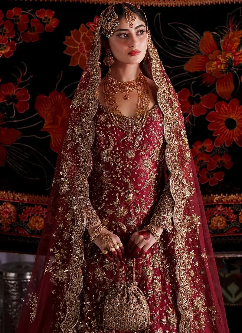 Deep red bridal long shirt front view with gold floral motifs and ornate scalloped dupatta borders