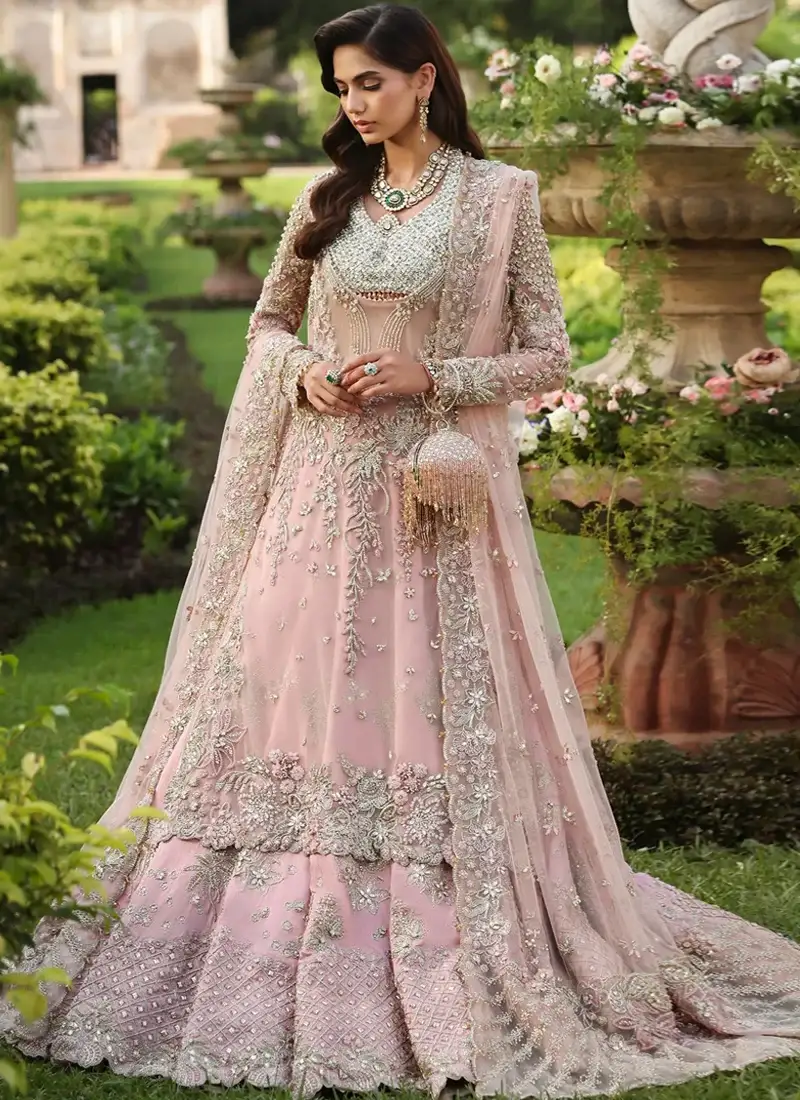 Dusty Pink Nikkah Long Shirt with Lehenga with Beaded Lattice Bodice Dusty pink bridal shirt close-up with a sparkling lattice bodice and floral embroidered sleeves