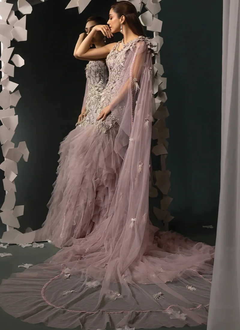 Dusty mauve mermaid gown full front view, with dense silver embroidery, ruffled skirt and trailing cape