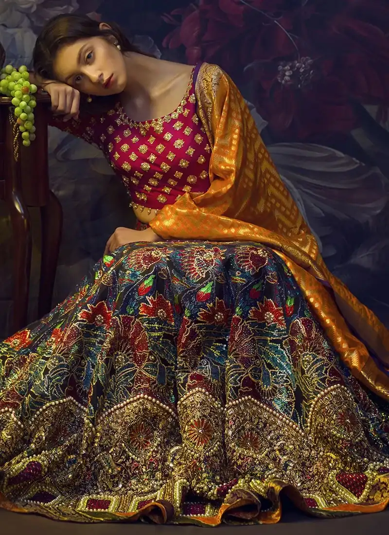 Multicolor Mehndi Lehenga Choli with Gold Floral Arches Fuchsia mehndi choli front close-up with scattered gold floral motifs and an embroidered round neckline