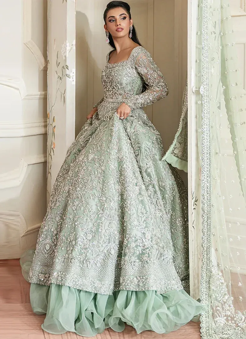 Sage green Nikkah maxi front view showing square neckline, silver embroidered panels and curled hem frills