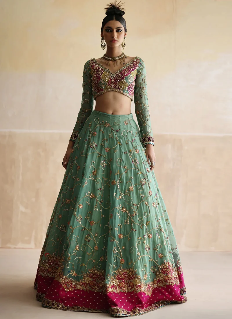 Sea green lehenga choli full front with embroidered V-neck blouse and gold floral-vine skirt