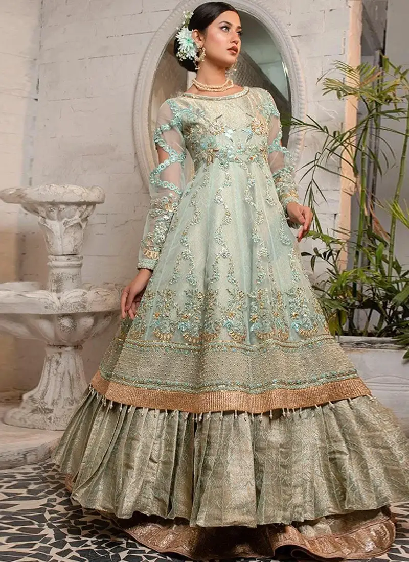 Sea Green Nikkah Frock with Lehenga with Scalloped Cutout Sleeves Sea green Nikkah pishwas seated view with sheer embroidered dupatta and pleated gold jamawar lehenga