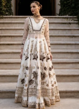 White bridal pishwas rear close-up with ornate multi-cut-out back and a gold-edged sheer dupatta